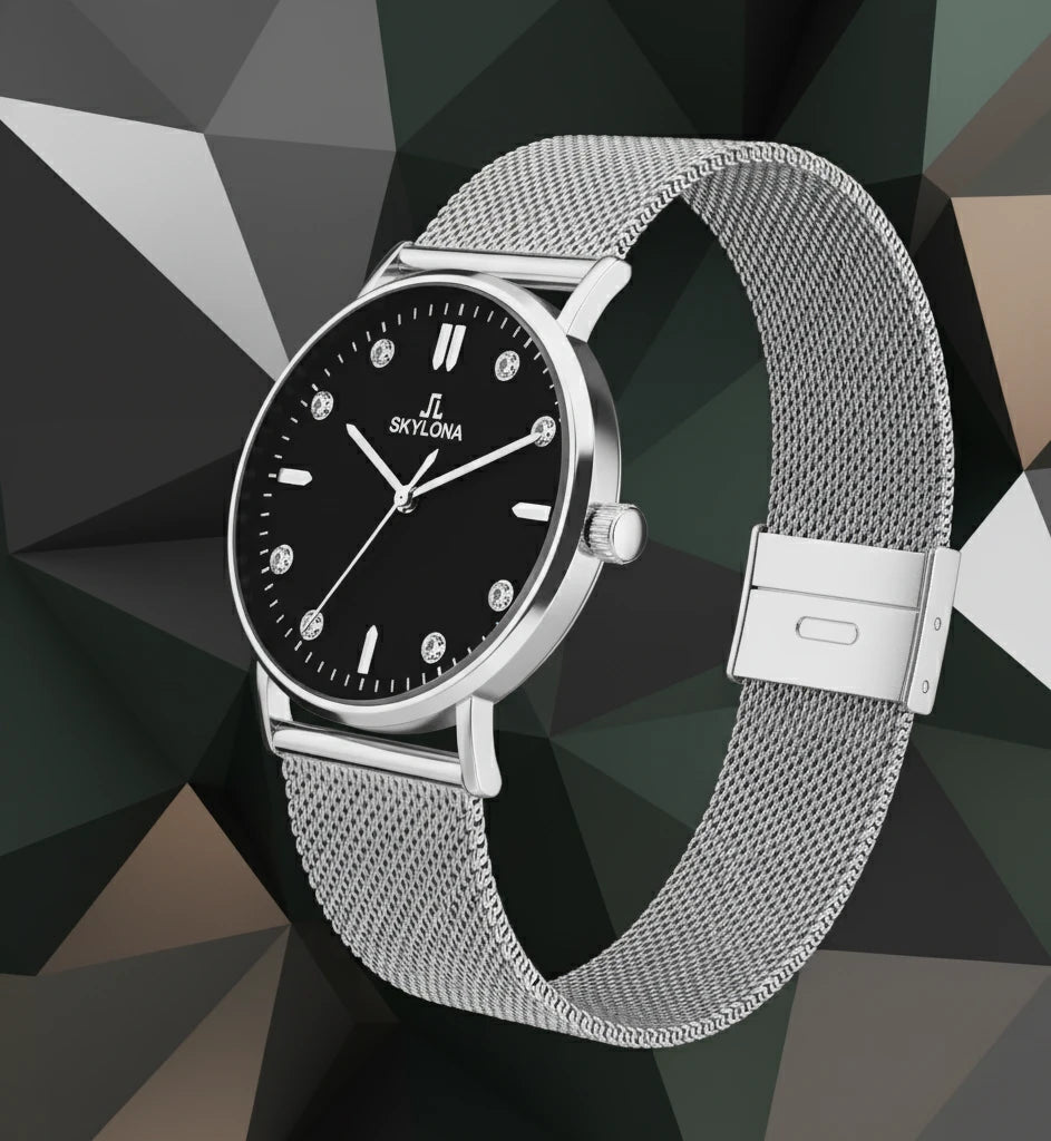 Close up of black dial on silver watch