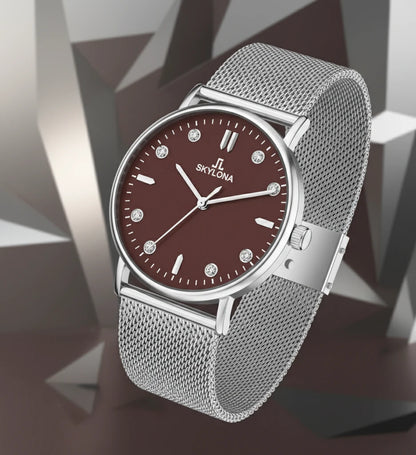Close up of brown face on silver watch