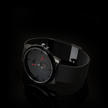 Red chronograph watch on wrist