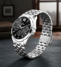 Men's silver stainless steel watch black face