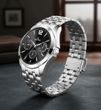 Men's silver stainless steel watch black face